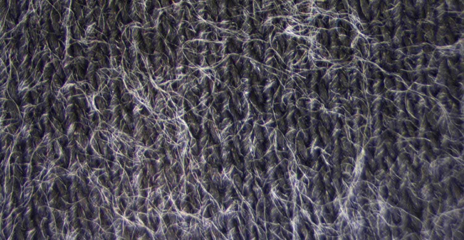 Comparison between a raw denim fabric before and after treatment with Garmon's biopolishing products